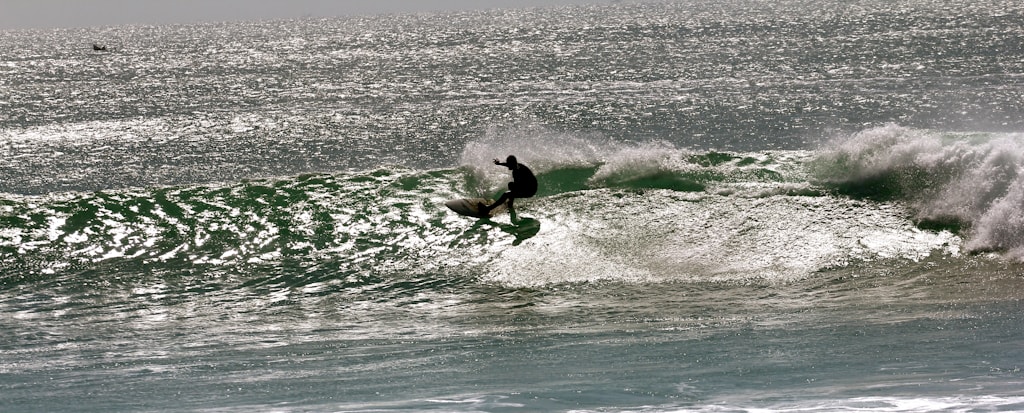 Surfer riding a wave on the Moroccan Atlantic coast